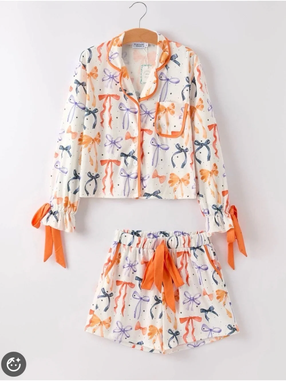 Primark White Elastic Waistband Shorts with Orange and Purple Star Print